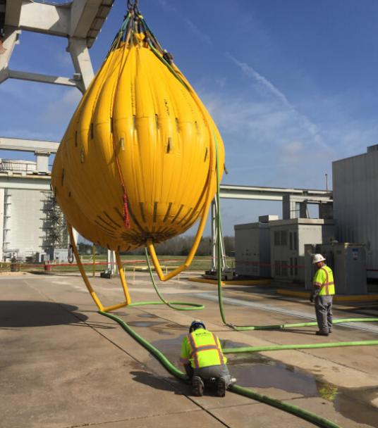 Proof load testing 60 ton gantry crane at power station using two 35 Te water bags.