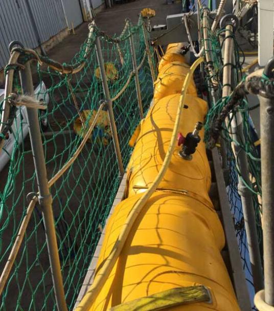 Load testing vessel gangway using 375 Kg cylinder type water bags.